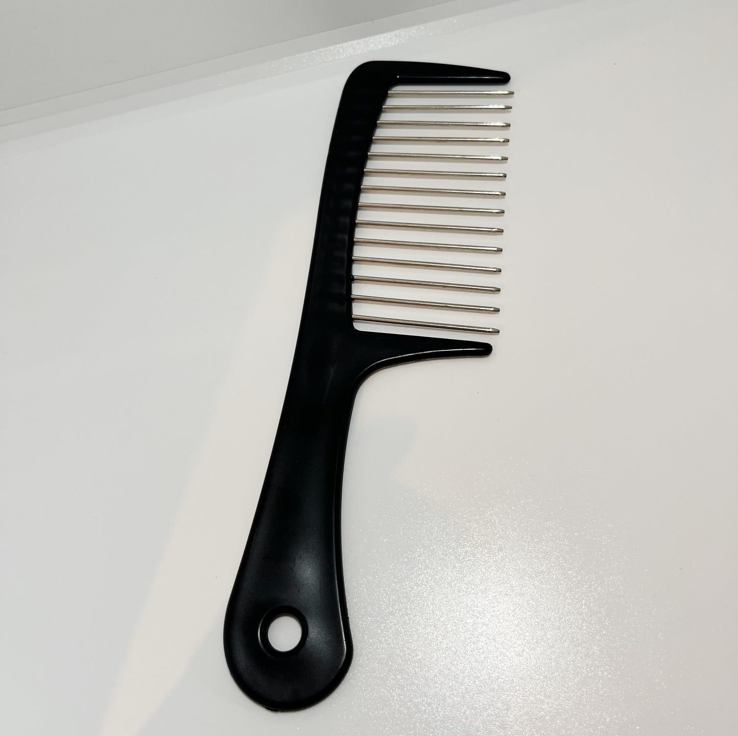 Black iron tooth comb